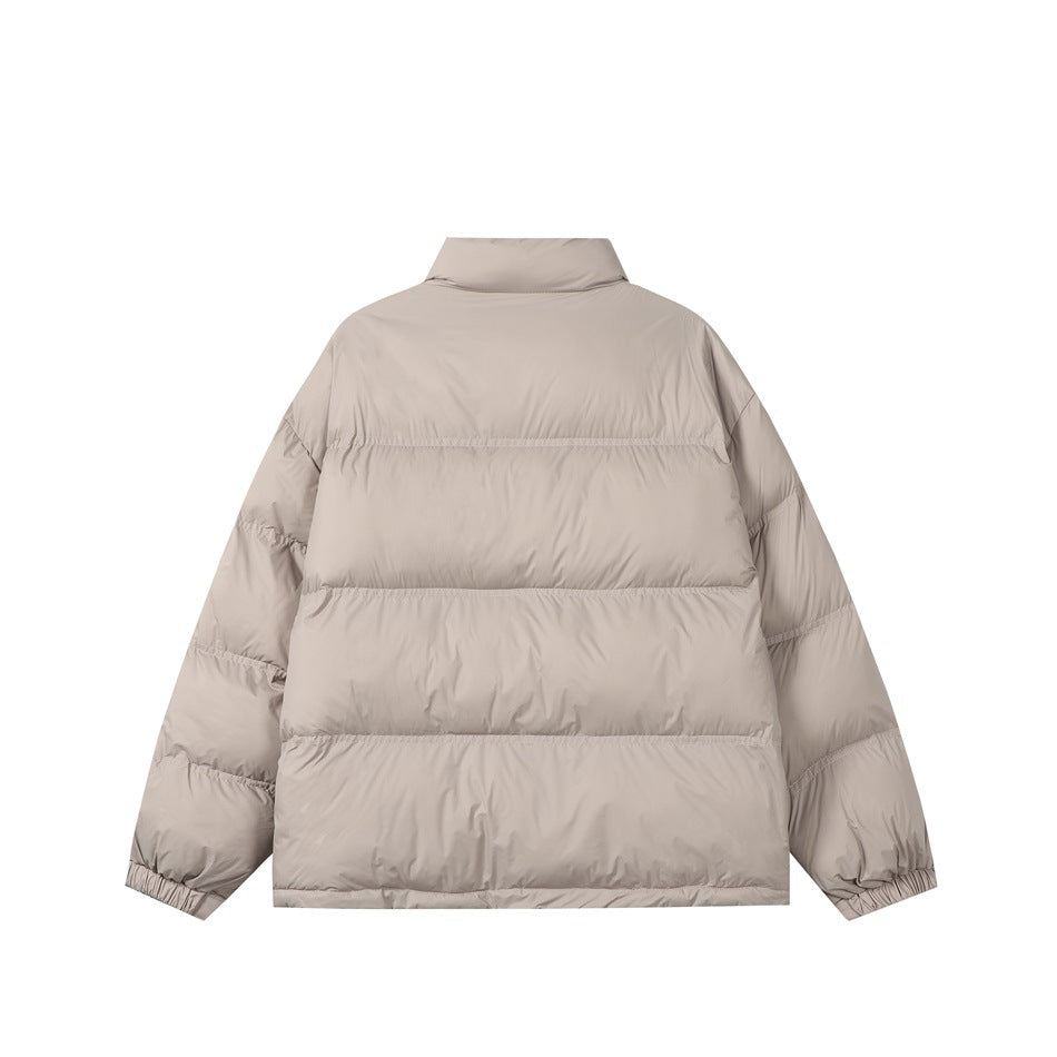 Back view of a light beige puffer jacket with a stand collar, horizontal quilted panels, and elasticated cuffs.