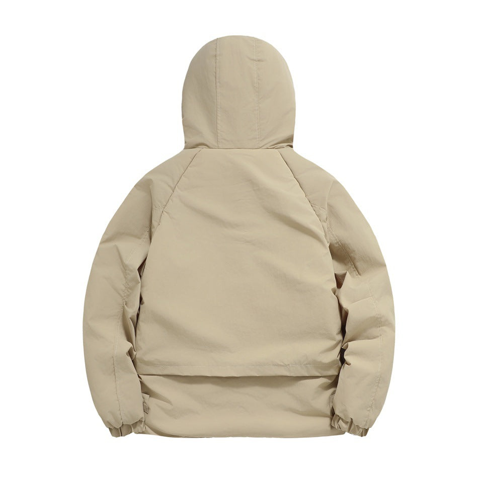 Full back view of a beige hooded jacket laid flat, with long sleeves, gathered cuffs, and a dropped hem panel.