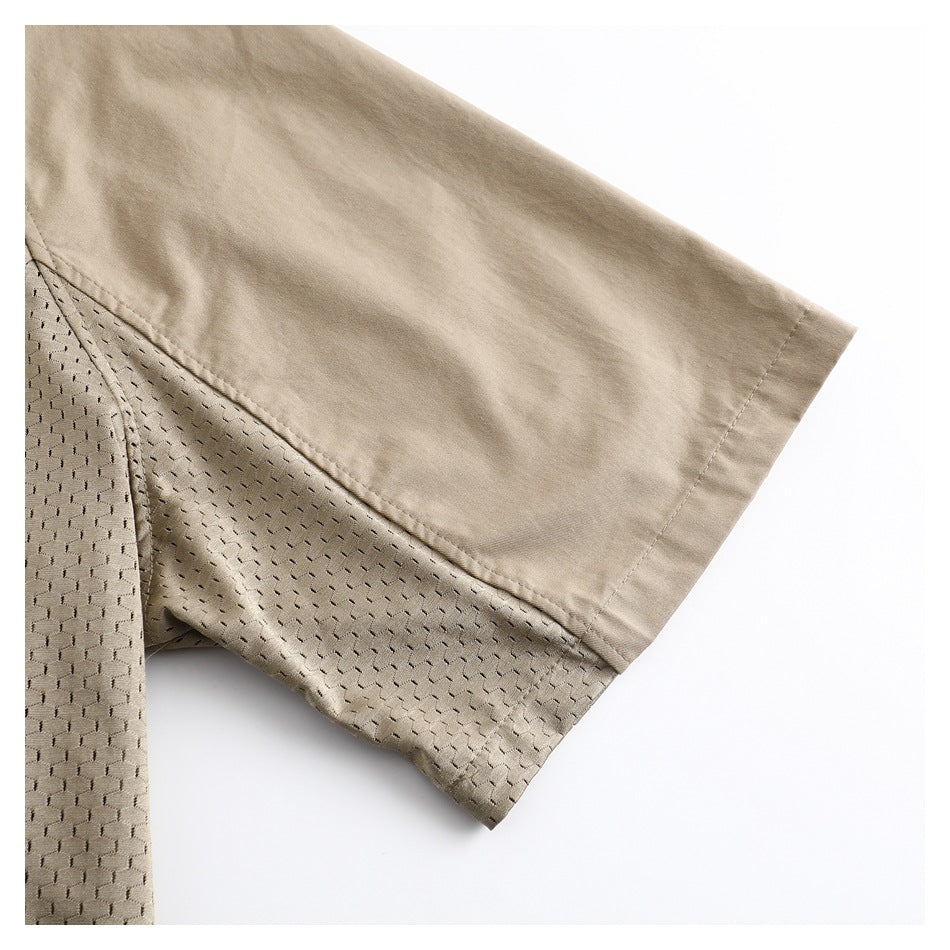 Close-up of a beige short sleeve with a textured mesh panel along the underside.