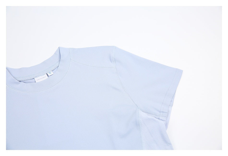 Close-up of the pale blue shirt's crew neckline, shoulder seam, and short sleeve.