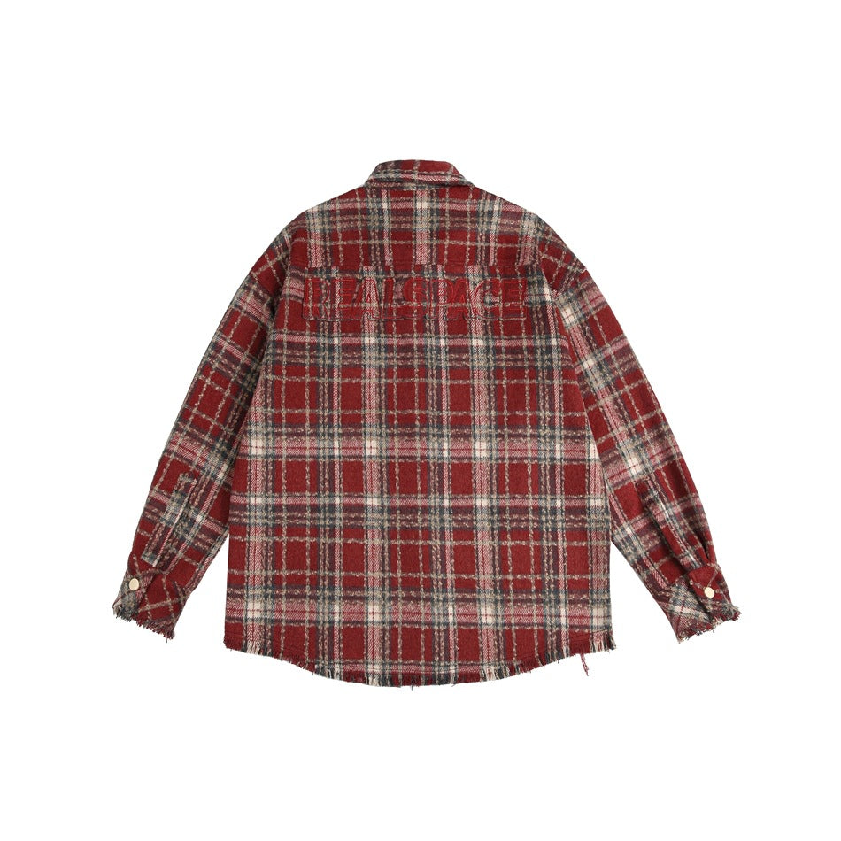 Back of a red tartan shirt jacket, shown flat with tonal lettering across the upper back.