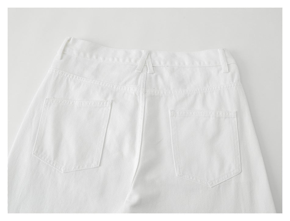 Back view of white trousers laid flat, showing two patch pockets, belt loops, and waistband.