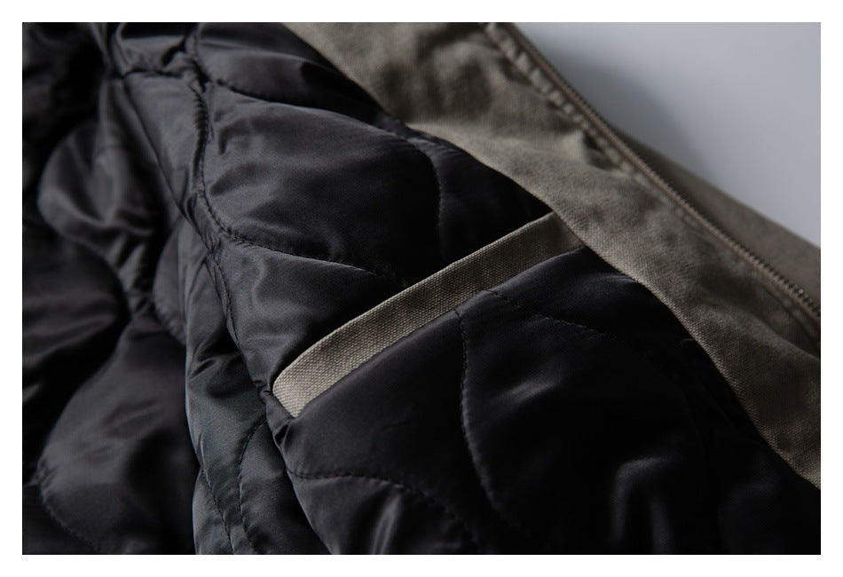 Close-up of the jacket's black quilted lining and an interior pocket.