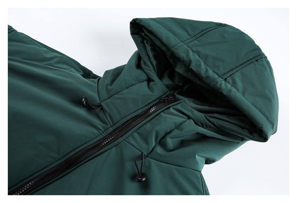 Close-up of a dark green jacket’s padded hood, black front zipper, and adjustable drawcords.