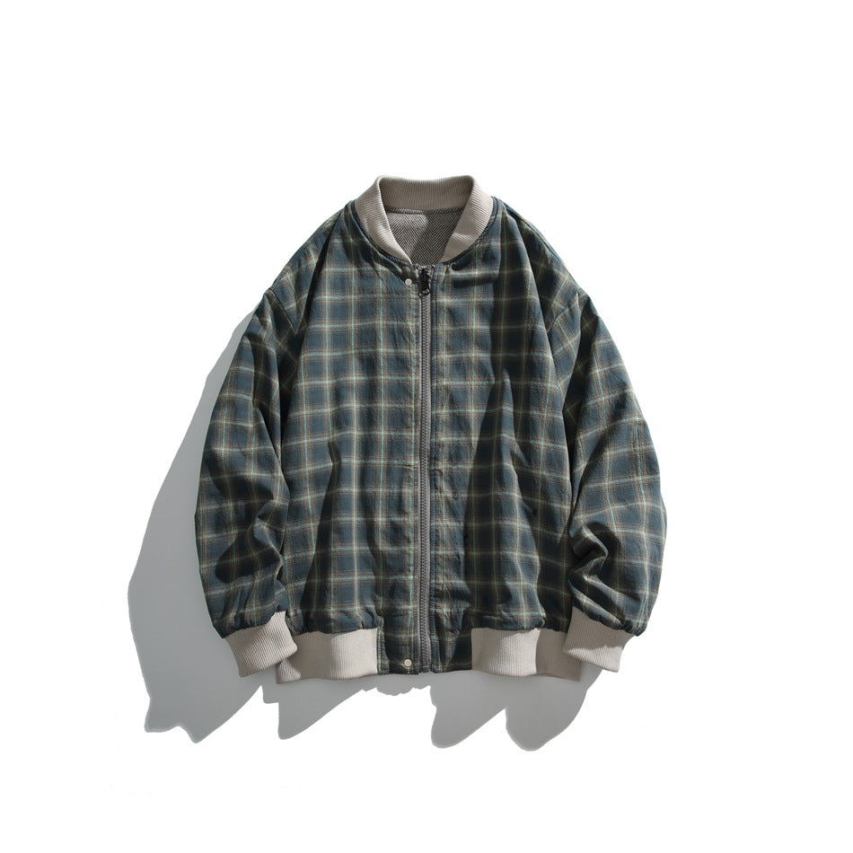 Blue plaid bomber jacket with a front zipper and white ribbed collar, cuffs and hem.