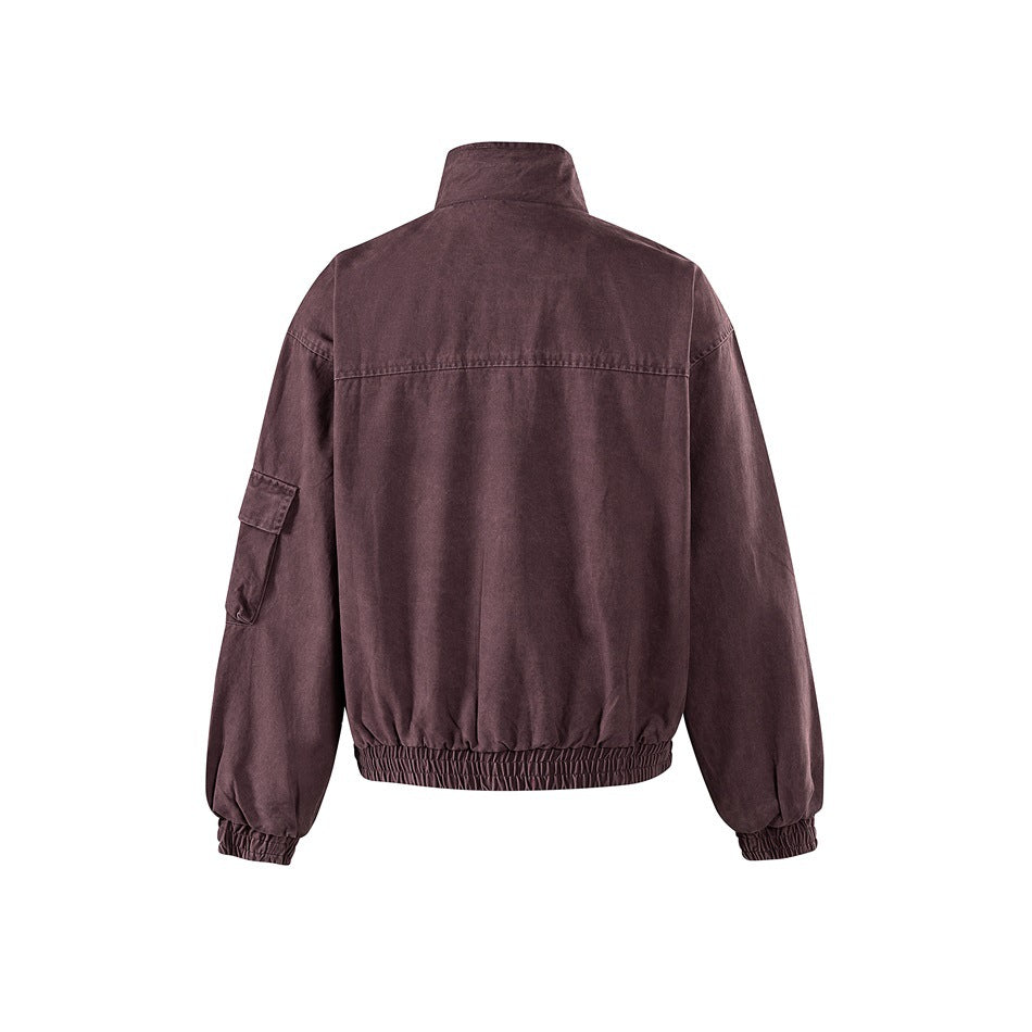 Back view of a plum jacket with a stand collar, sleeve pocket, and elasticated cuffs and hem.