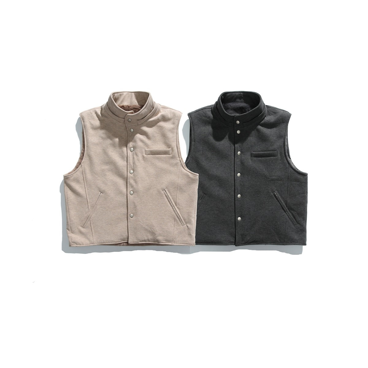 Khaki and gray sleeveless snap-front vests with stand collars, chest pockets and slanted pockets laid flat