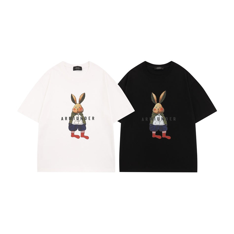 White and black short-sleeve T-shirts, each with a colorful rabbit graphic and lettering on the front.