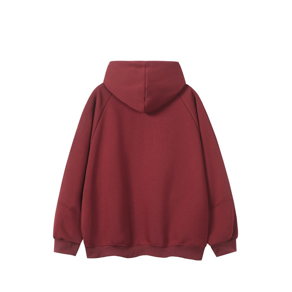 Back view of a plain burgundy hooded sweatshirt with ribbed cuffs and hem.