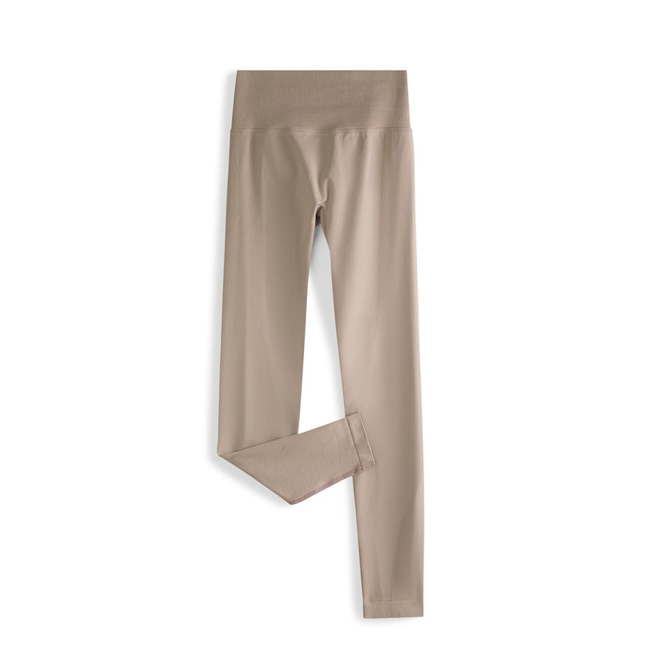 Taupe high-waisted ankle-length leggings laid flat with one leg folded