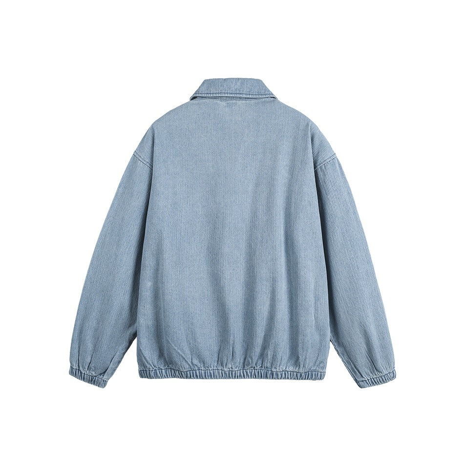 Back view of a light blue collared jacket with long sleeves and gathered cuffs and hem.