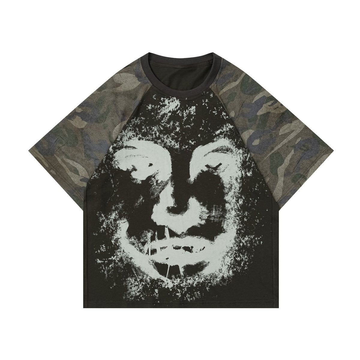 Flat-lay front of a camouflage-sleeve raglan T-shirt with a distressed pale face graphic on a dark body