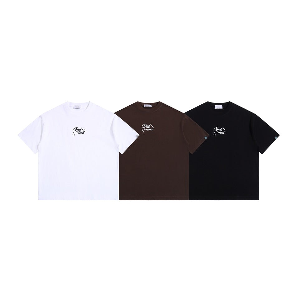 Three short-sleeve crew-neck T-shirts in white, dark brown, and black, each with a small chest graphic.
