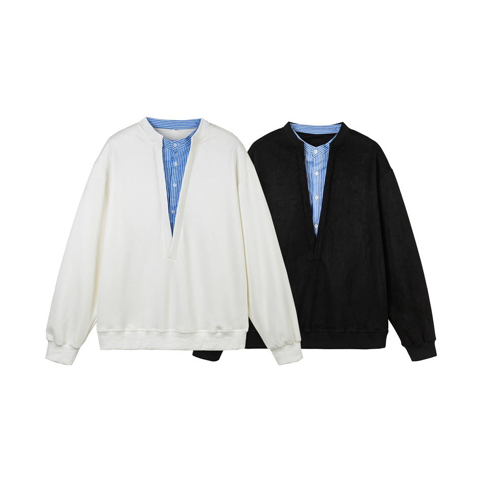 White and black oversized split-neck pullovers shown side by side.
