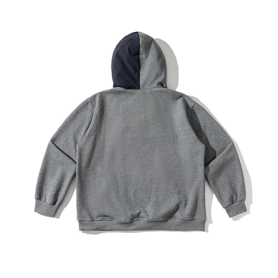 Back view of a gray hoodie with a two-tone navy and gray hood, ribbed cuffs, and hem.
