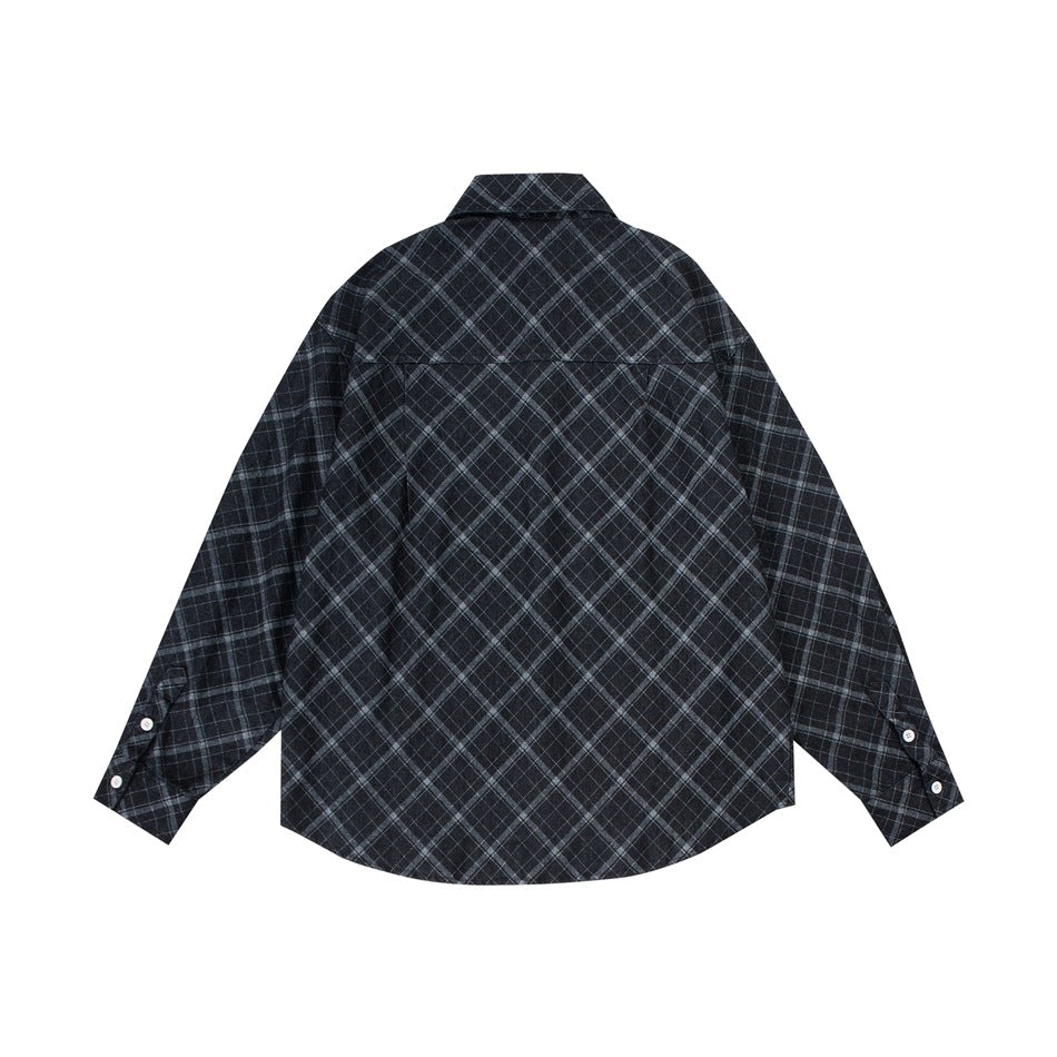 Back view of a black and gray plaid button-up shirt with long sleeves and a curved hem on white.