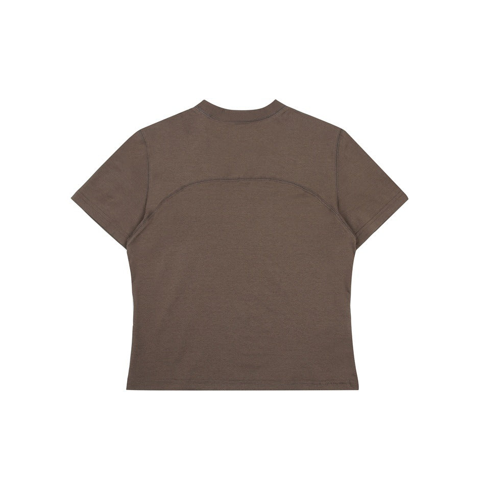 Flat-lay back view of a brown short-sleeve crew-neck shirt with curved seam detailing across the upper back.