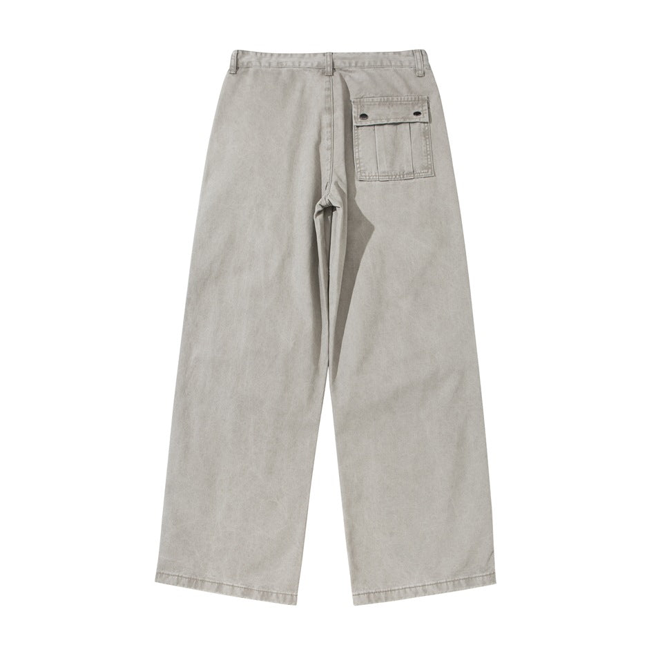 Back view of light gray wide-leg pants with a snap-button flap pocket on the right