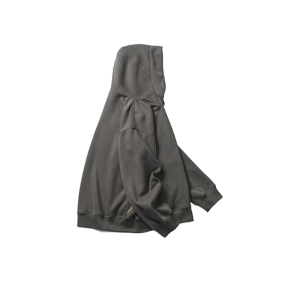 Charcoal hooded sweatshirt shown folded at an angle, with a raised hood, long sleeves, and ribbed cuffs and hem.