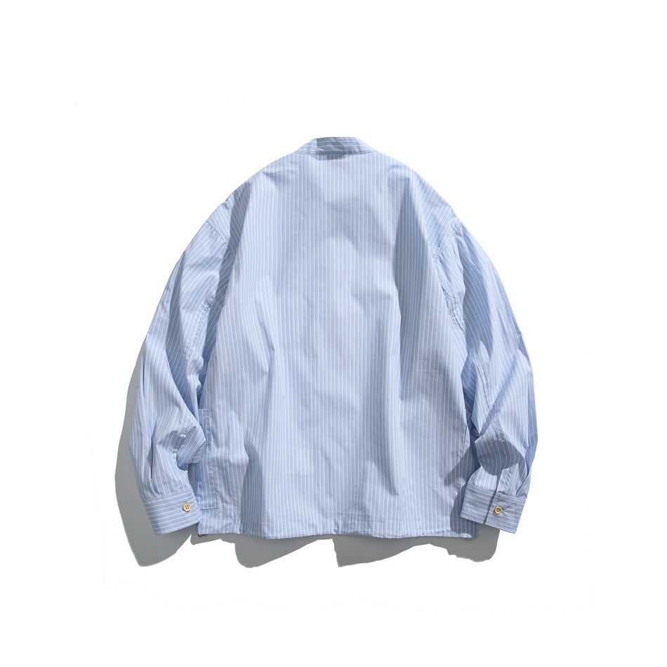 Back view of light blue pinstriped long-sleeve shirt with band collar and button cuffs, flat lay