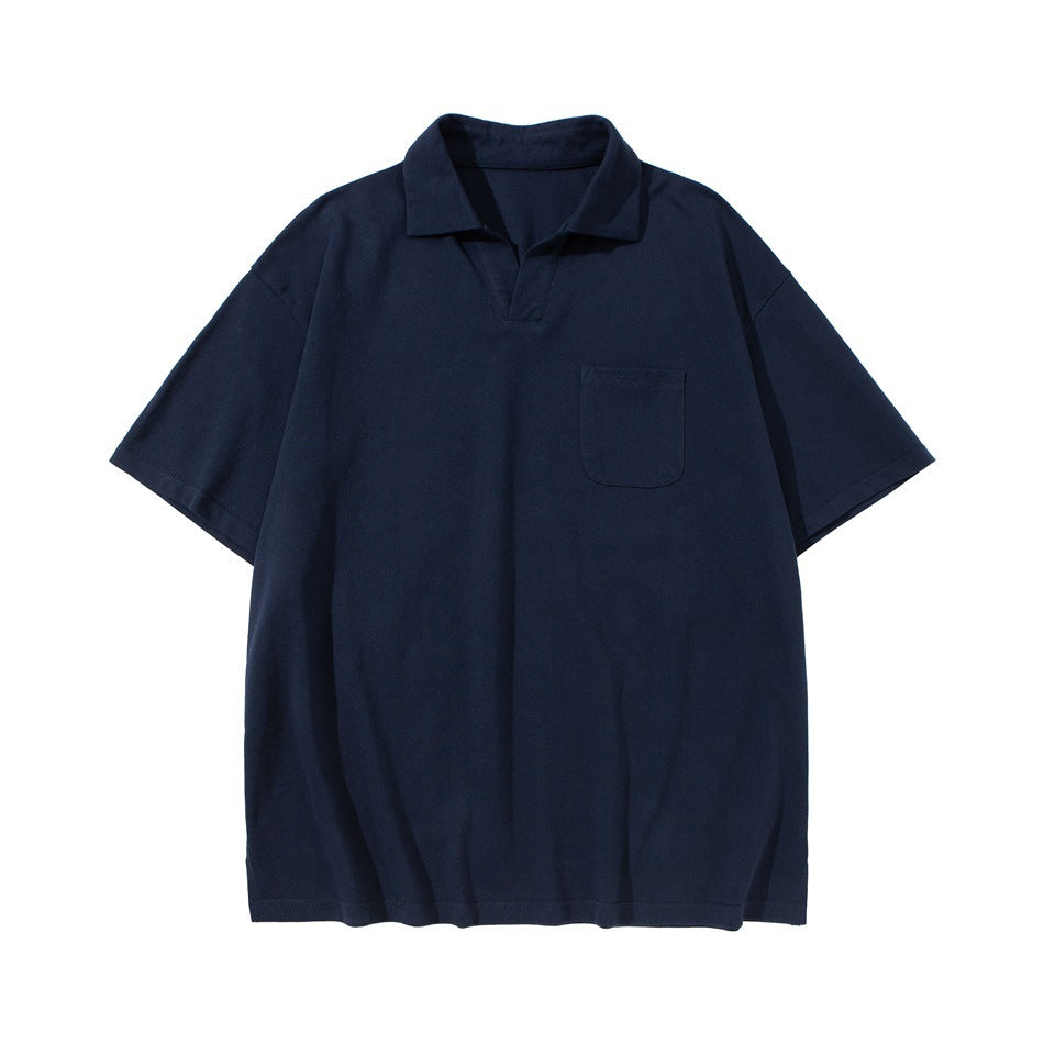 Navy blue short-sleeved polo-style shirt with open V-neck collar and chest pocket, flat lay
