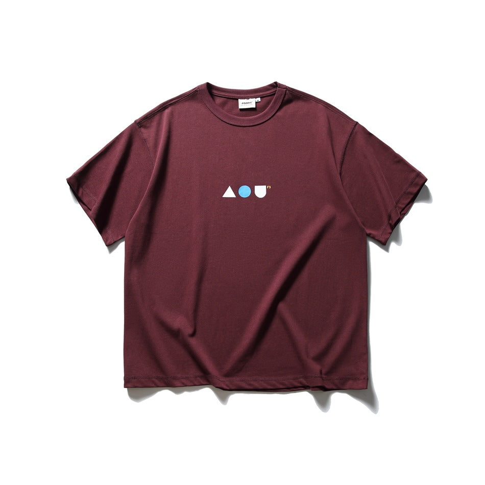 Burgundy short-sleeve T-shirt laid flat, with a small geometric chest graphic in white and blue.