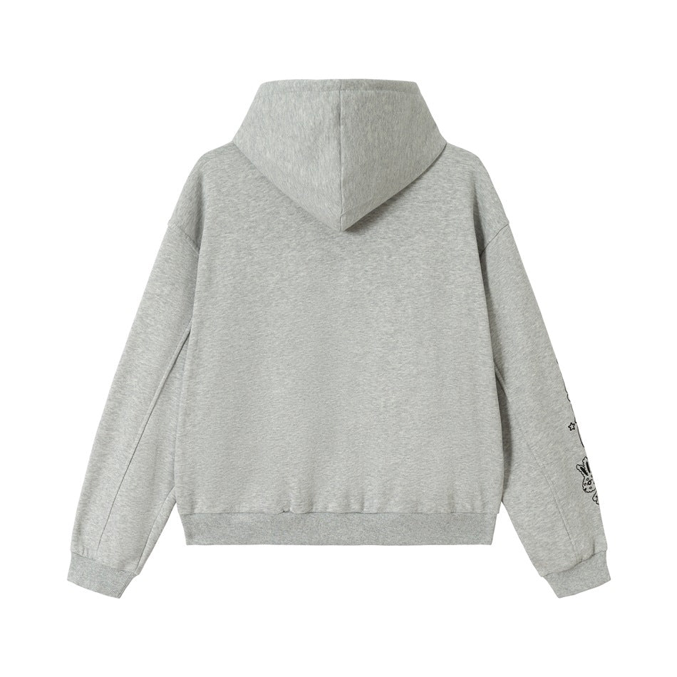 Back view of a gray hooded sweatshirt with ribbed cuffs and hem and a small black graphic on one sleeve.