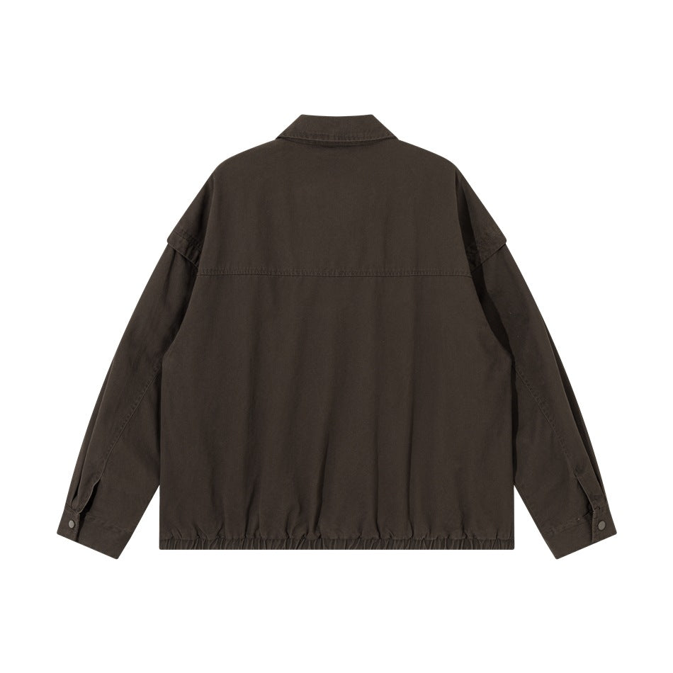 Back view of a dark brown jacket with a yoke seam, long sleeves, and a gathered hem.
