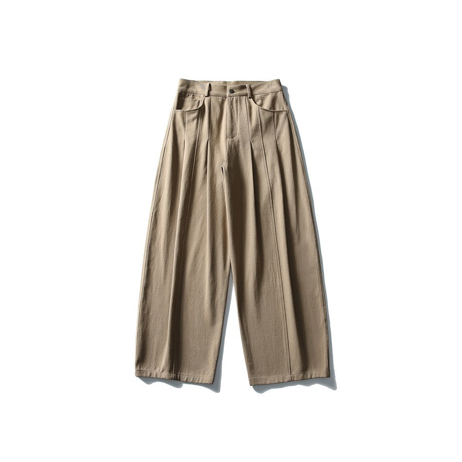 Khaki wide-leg pleated pants flat lay, front view with button closure and slanted pockets