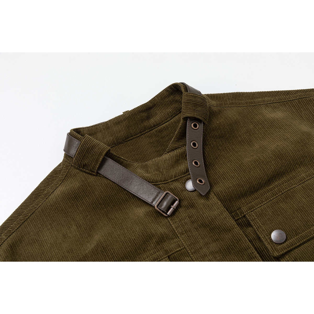 Close-up of the olive jacket's collar, brown adjustable strap, snap fasteners and chest pocket.