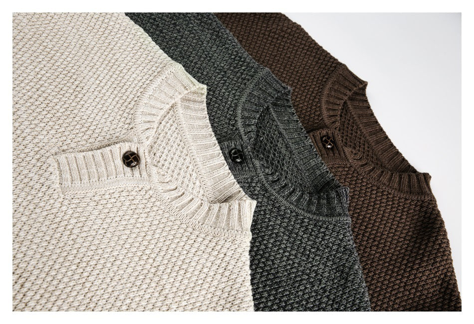 Three textured knit sweaters in cream, charcoal gray, and brown, showing ribbed necklines and buttoned plackets.