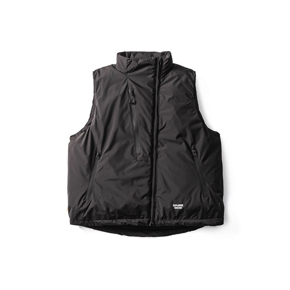 Black sleeveless vest shown flat from the front, with a high collar, asymmetric zipper, and zip pockets.