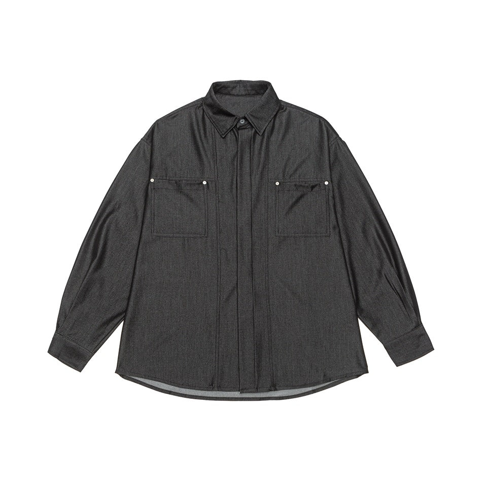 Black denim-look button-up shirt flat lay, front view, with two chest pockets and metal stud accents
