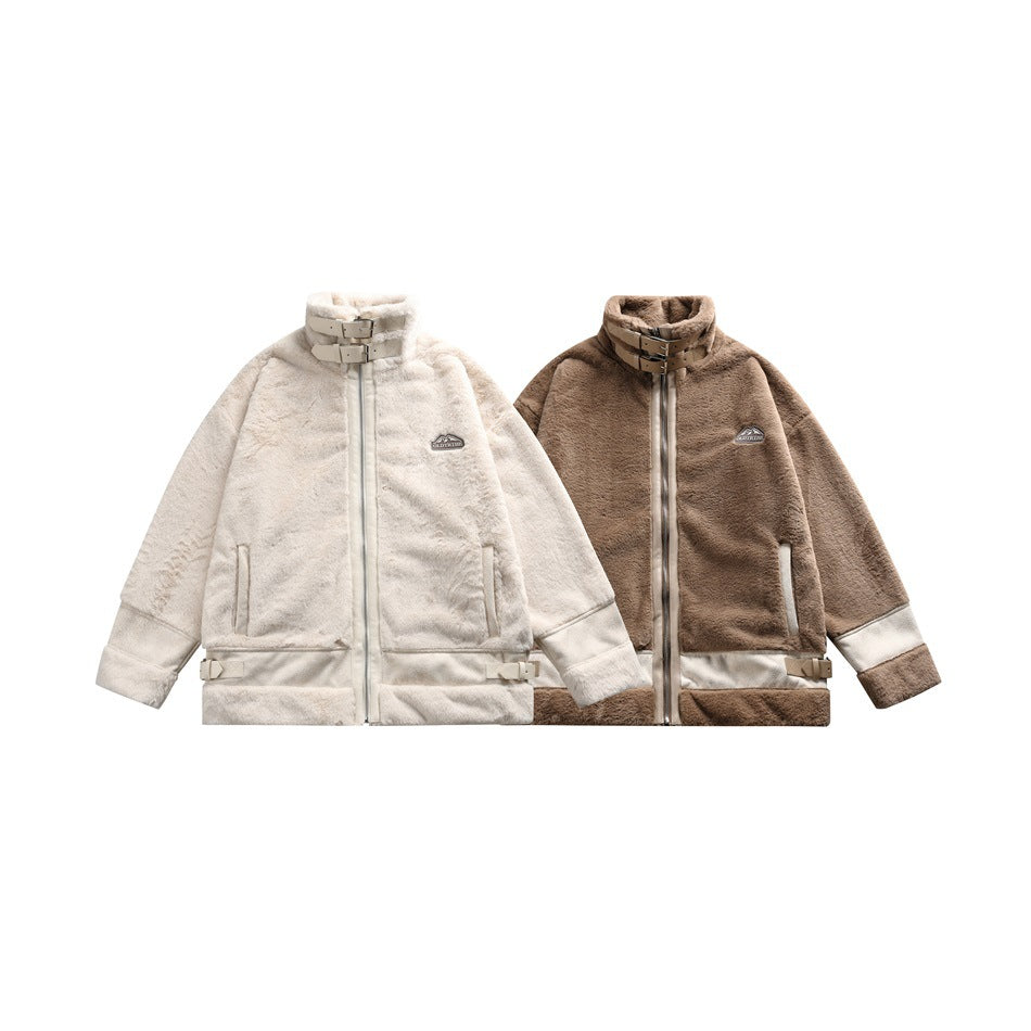 Two front views of faux-fur jackets, one ivory and one taupe, with stand collars, zippers and buckle details.
