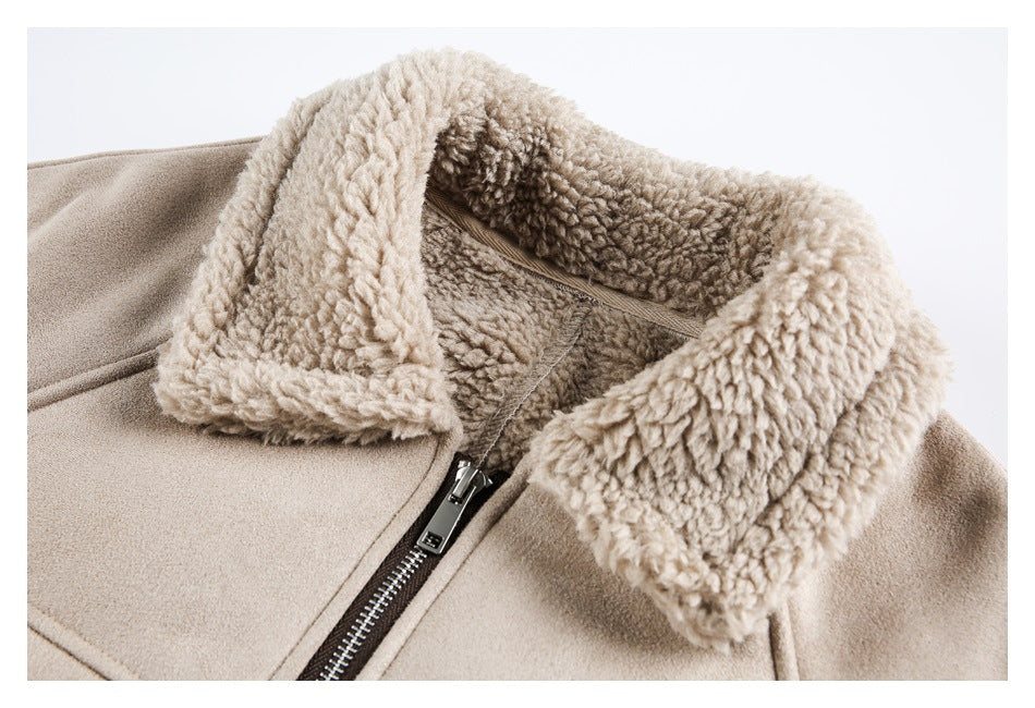 Close-up of a taupe jacket's plush fleece collar, inner lining, and front zipper.