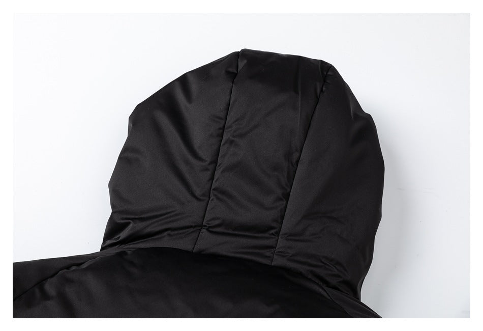Close-up of the black garment's hood, showing its panel seams.