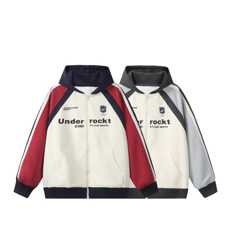 Two front-view zip-up hoodies: one cream with red and navy panels, the other cream with gray and black panels.