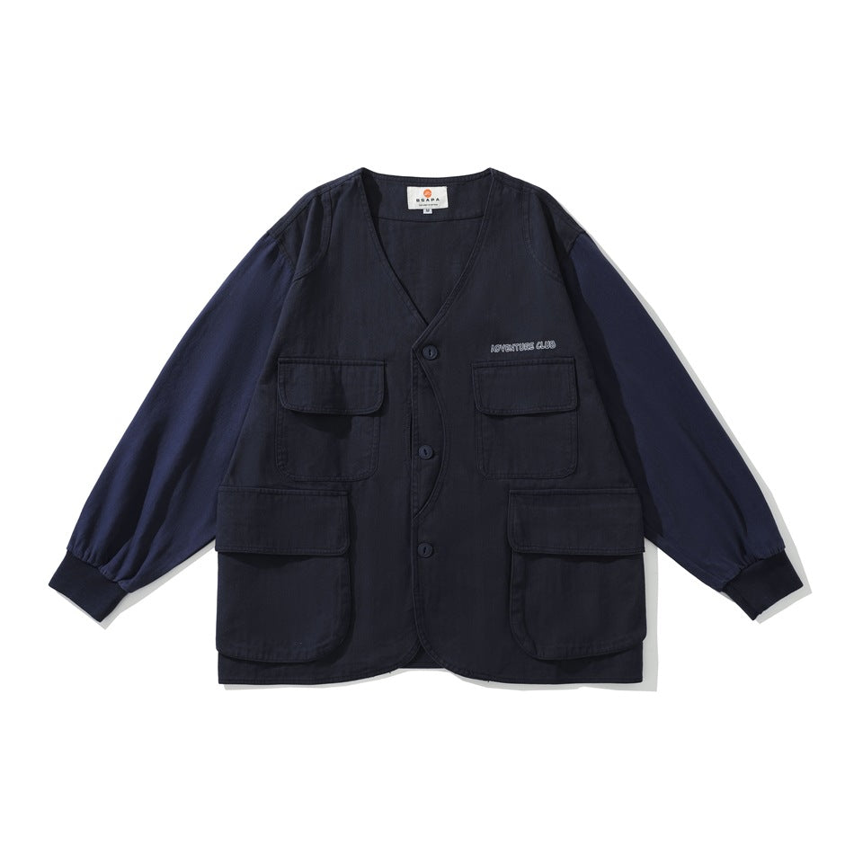 Navy blue collarless V-neck jacket with four flap pockets, button front and ribbed cuffs, flat lay front view