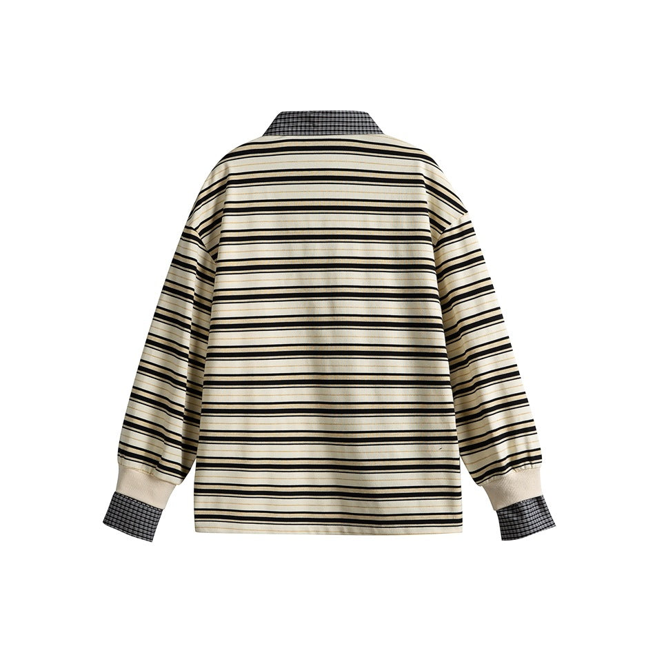 Back view of a cream long-sleeve shirt with black and tan stripes, a checked collar, and checked cuff accents.