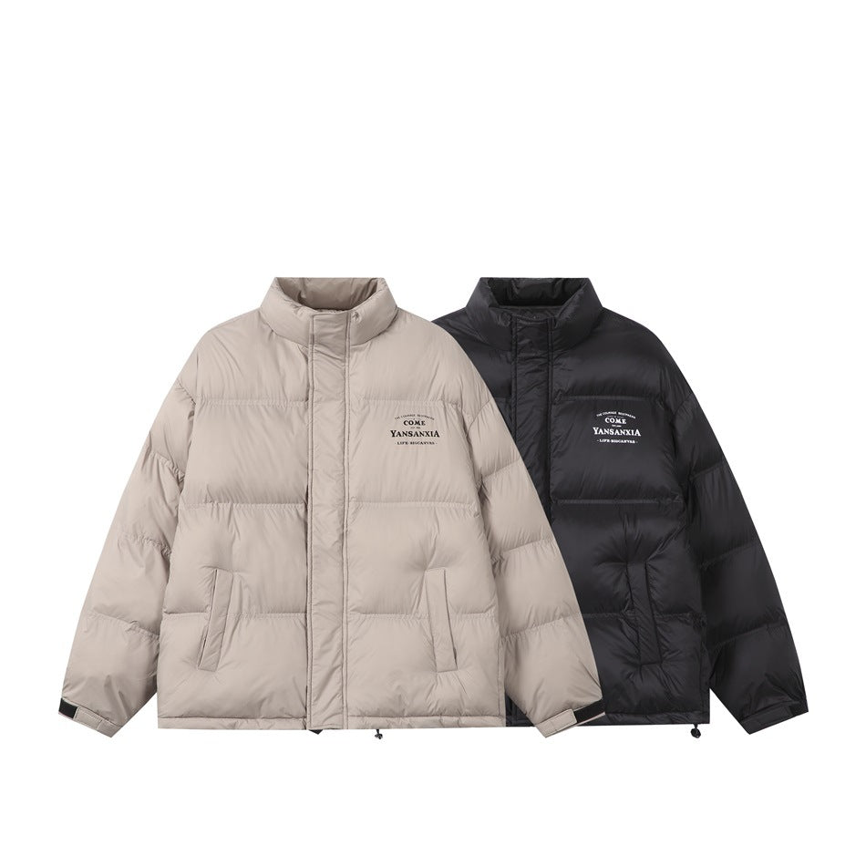 Two puffer jackets shown together in taupe and black, each with a high collar and front pockets.