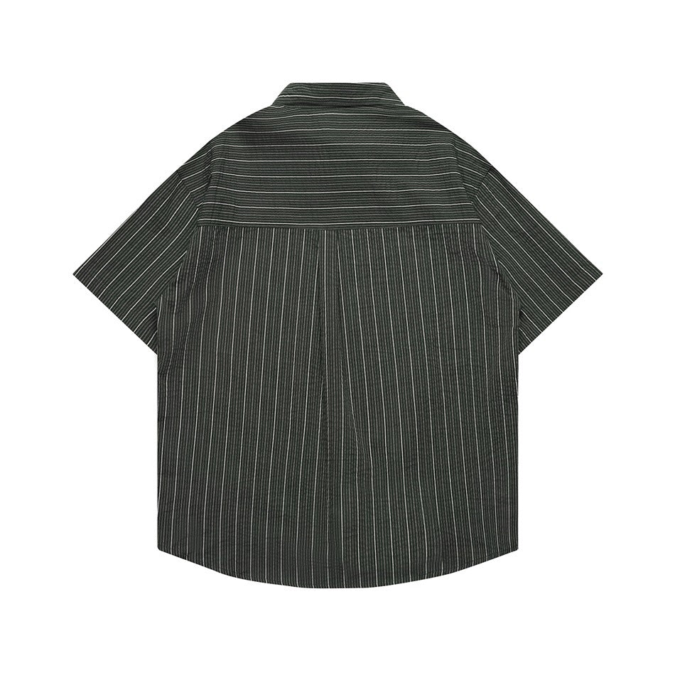 Back view of a dark short-sleeve shirt with fine vertical stripes and a horizontal yoke seam.
