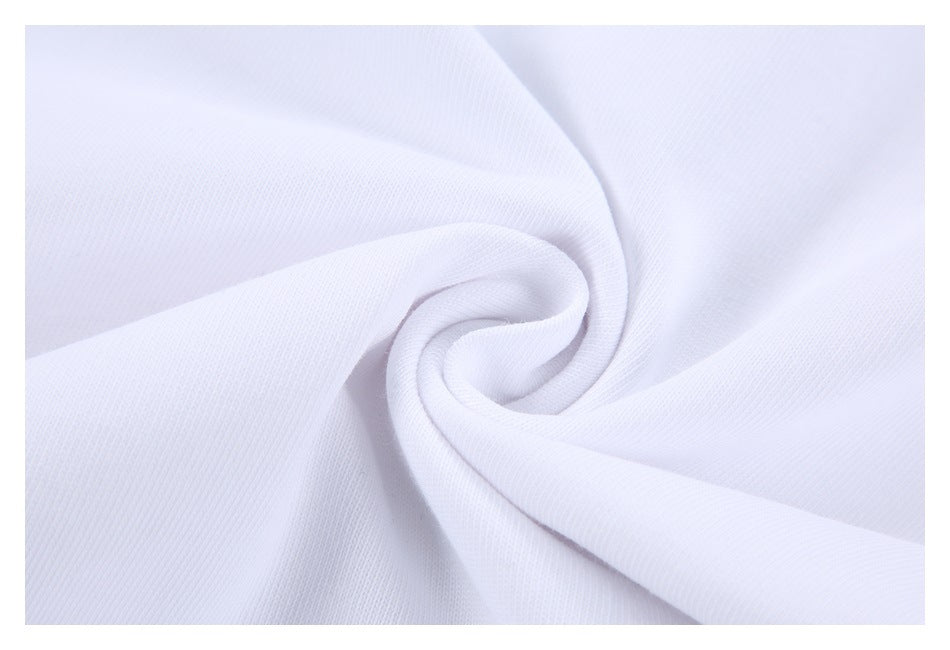 White fabric twisted into a small spiral to show its drape and surface texture.