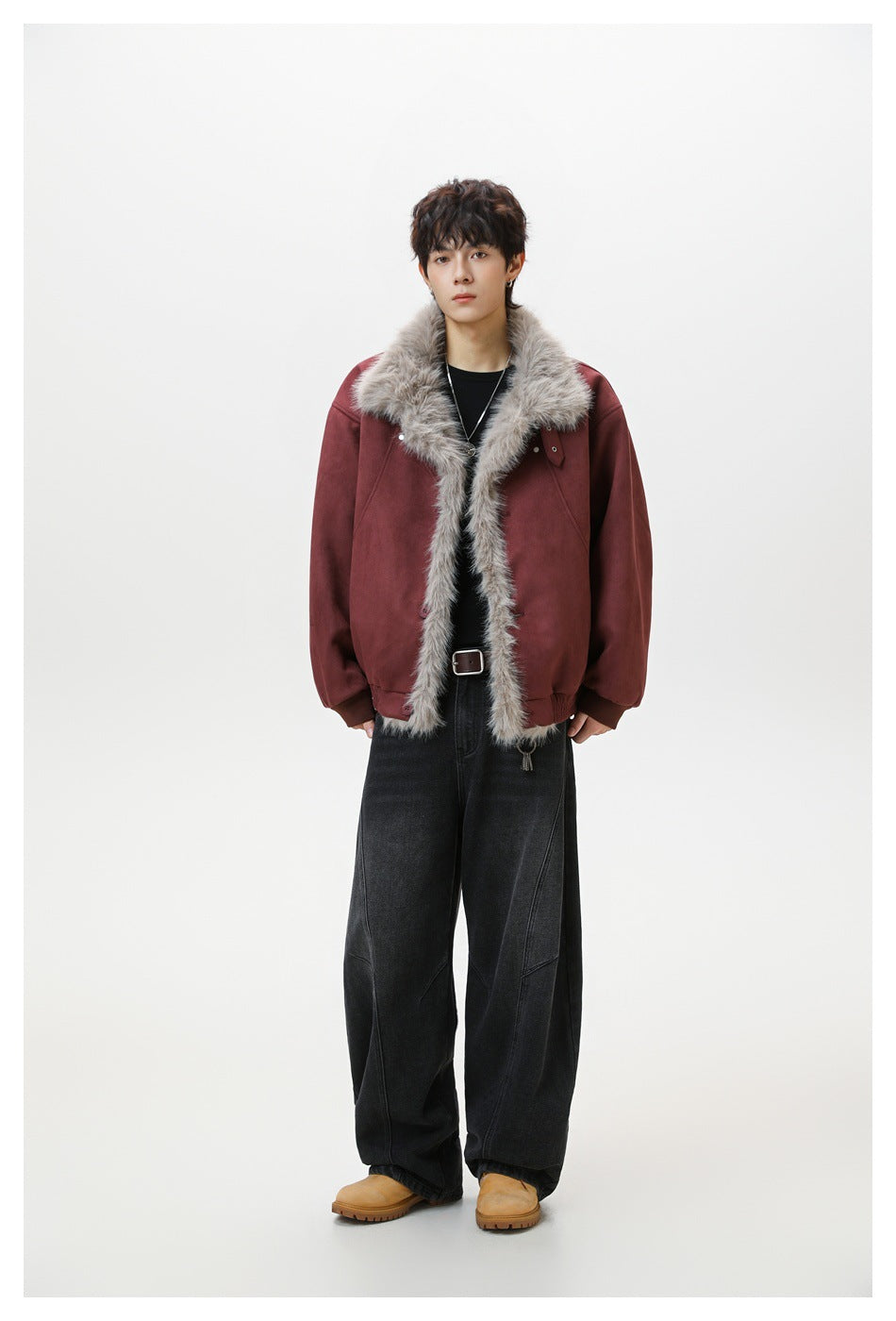 Model wearing a burgundy jacket with a wide gray fur collar and front trim.