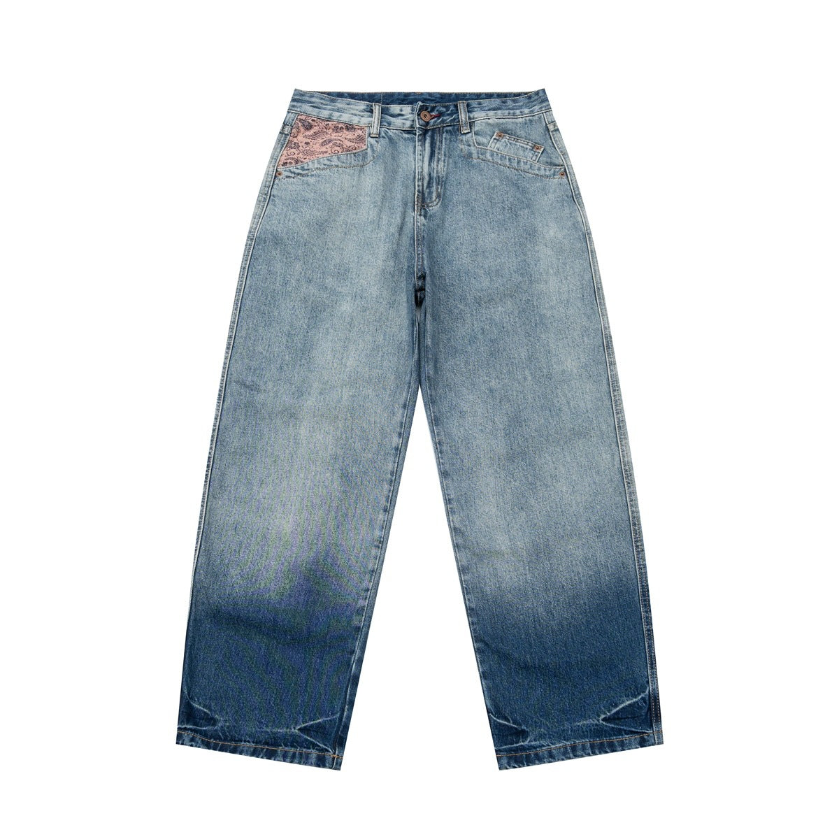 Front view of faded blue wide-leg jeans with a pink paisley pocket panel and darker gradient hem