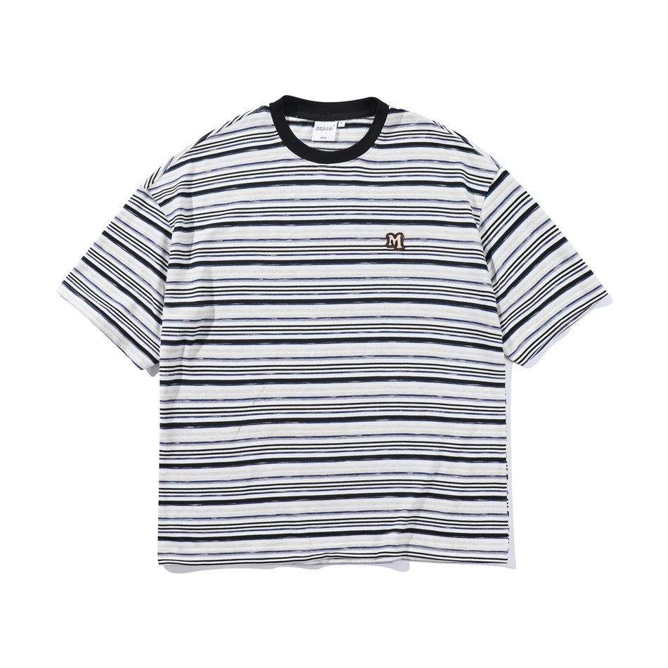 Front view of a white short-sleeve T-shirt with thin black, navy, and gray stripes, a black crew neck, and a small M chest