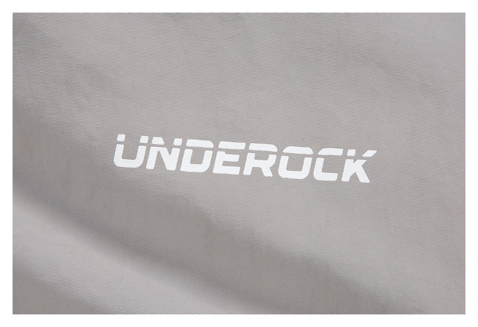 Close-up of a white stylized logo printed on the light gray jacket fabric.