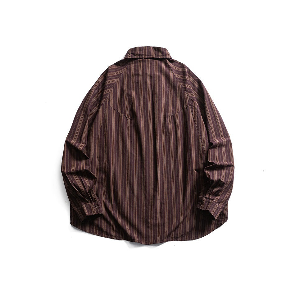 Back view of dark brown striped long-sleeve shirt showing raglan sleeves, back yoke seam and button cuffs