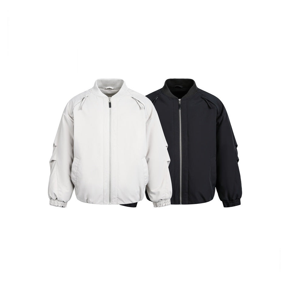 Two front views of a zip-front bomber jacket, shown in light gray and black, with ribbed collars and gathered cuffs.