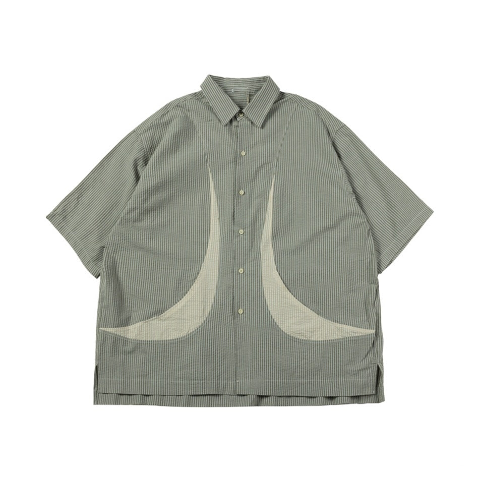 Green striped short-sleeve button-up shirt with curved cream contrast panels, flat front view