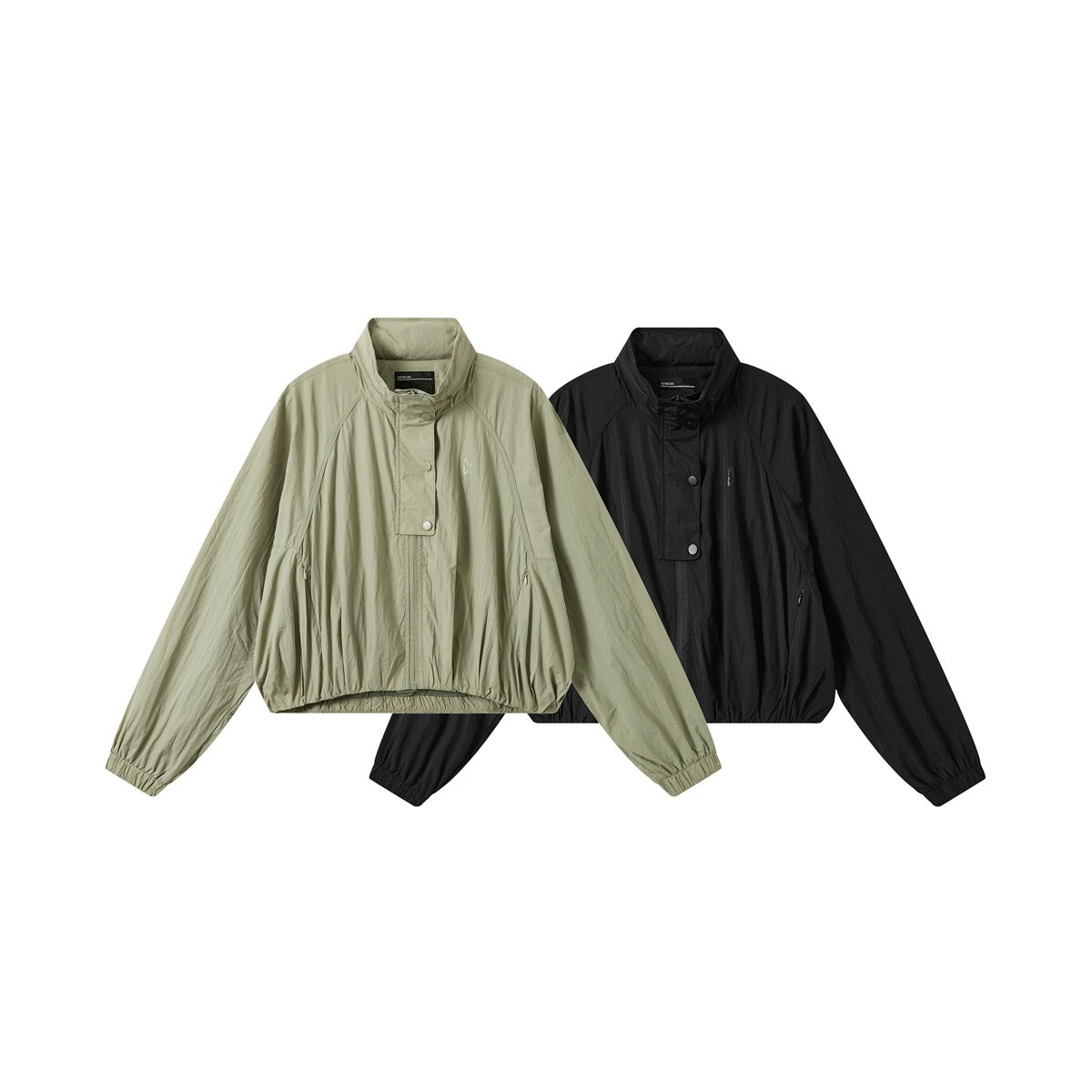 Two cropped jackets shown from the front: one pale sage and one black, both with high collars and long sleeves.